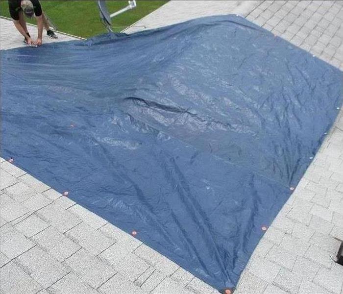 Tarp Covered Damaged Roof