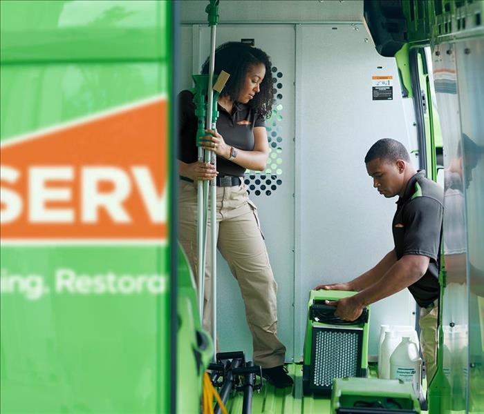 Image of SERVPRO employees preparing for a job